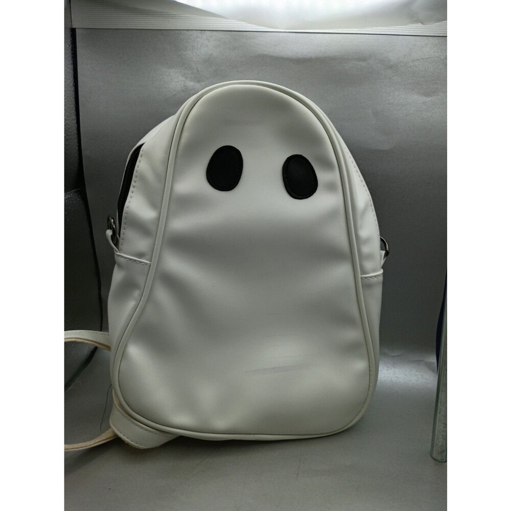 white ghost-shaped novelty backpack features a smooth PU leather finish with...